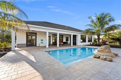 Nestled in the serene confines of the highly-sought Cobblestone on The Cape Club of Palm City in Florida - for sale on GolfHomes.com, golf home, golf lot