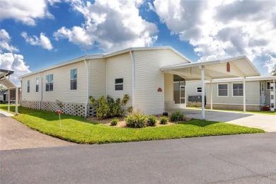 Florida Living at Its Finest in Sought-After Americana Cove - on Mangrove Bay Golf Course in Florida - for sale on GolfHomes.com, golf home, golf lot