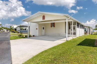 Florida Living at Its Finest in Sought-After Americana Cove - on Mangrove Bay Golf Course in Florida - for sale on GolfHomes.com, golf home, golf lot
