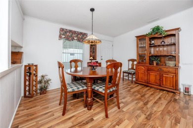 Florida Living at Its Finest in Sought-After Americana Cove - on Mangrove Bay Golf Course in Florida - for sale on GolfHomes.com, golf home, golf lot