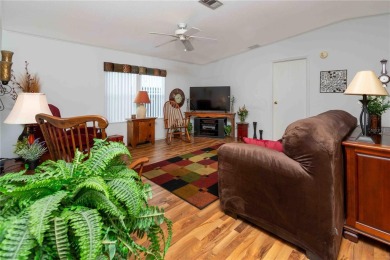 Florida Living at Its Finest in Sought-After Americana Cove - on Mangrove Bay Golf Course in Florida - for sale on GolfHomes.com, golf home, golf lot