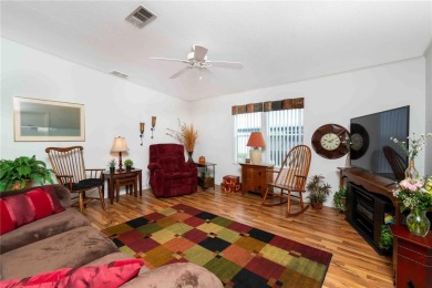 Florida Living at Its Finest in Sought-After Americana Cove - on Mangrove Bay Golf Course in Florida - for sale on GolfHomes.com, golf home, golf lot