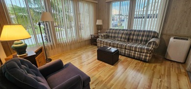 MODERN, Stunning 2 bedroom 2 bath home in 55 + Resort style on Zephyrhills Municipal Golf Course in Florida - for sale on GolfHomes.com, golf home, golf lot