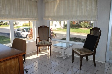 PRICED TO SELL!  It's not very often that a 2/2/2 1794 sq ft htd on Mainlands Golf Club in Florida - for sale on GolfHomes.com, golf home, golf lot