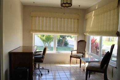 PRICED TO SELL!  It's not very often that a 2/2/2 1794 sq ft htd on Mainlands Golf Club in Florida - for sale on GolfHomes.com, golf home, golf lot