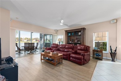 Spectacular lake and golf course views are featured in this on Worthington Country Club in Florida - for sale on GolfHomes.com, golf home, golf lot