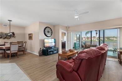 Spectacular lake and golf course views are featured in this on Worthington Country Club in Florida - for sale on GolfHomes.com, golf home, golf lot