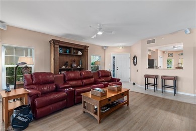 Spectacular lake and golf course views are featured in this on Worthington Country Club in Florida - for sale on GolfHomes.com, golf home, golf lot