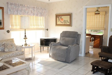 PRICED TO SELL!  It's not very often that a 2/2/2 1794 sq ft htd on Mainlands Golf Club in Florida - for sale on GolfHomes.com, golf home, golf lot