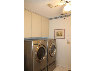 PRICED TO SELL!  It's not very often that a 2/2/2 1794 sq ft htd on Mainlands Golf Club in Florida - for sale on GolfHomes.com, golf home, golf lot