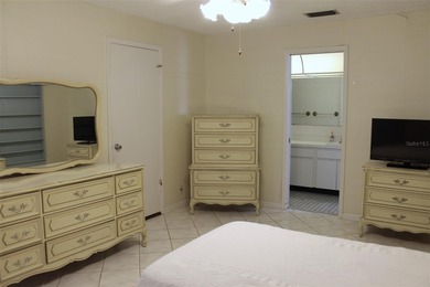 PRICED TO SELL!  It's not very often that a 2/2/2 1794 sq ft htd on Mainlands Golf Club in Florida - for sale on GolfHomes.com, golf home, golf lot