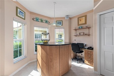 Spectacular lake and golf course views are featured in this on Worthington Country Club in Florida - for sale on GolfHomes.com, golf home, golf lot