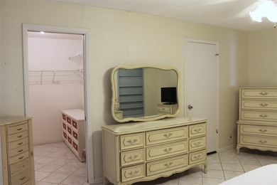 PRICED TO SELL!  It's not very often that a 2/2/2 1794 sq ft htd on Mainlands Golf Club in Florida - for sale on GolfHomes.com, golf home, golf lot