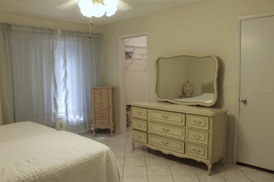 PRICED TO SELL!  It's not very often that a 2/2/2 1794 sq ft htd on Mainlands Golf Club in Florida - for sale on GolfHomes.com, golf home, golf lot