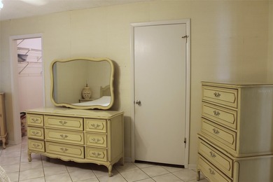 PRICED TO SELL!  It's not very often that a 2/2/2 1794 sq ft htd on Mainlands Golf Club in Florida - for sale on GolfHomes.com, golf home, golf lot