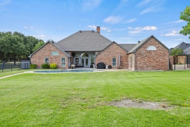 Nestled in one of Sunnyvale's most picturesque neighborhoods on Town East Golf Center in Texas - for sale on GolfHomes.com, golf home, golf lot