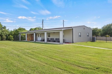 Nestled in one of Sunnyvale's most picturesque neighborhoods on Town East Golf Center in Texas - for sale on GolfHomes.com, golf home, golf lot