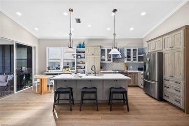 Beautifully updated single-family home in the sought-after on Pelican Sound Golf and River Club in Florida - for sale on GolfHomes.com, golf home, golf lot