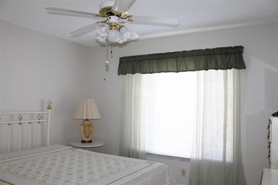 PRICED TO SELL!  It's not very often that a 2/2/2 1794 sq ft htd on Mainlands Golf Club in Florida - for sale on GolfHomes.com, golf home, golf lot