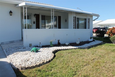 PRICED TO SELL!  It's not very often that a 2/2/2 1794 sq ft htd on Mainlands Golf Club in Florida - for sale on GolfHomes.com, golf home, golf lot