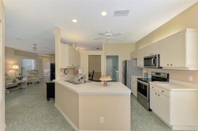 This FABULOUS 2 bed, 2 bath home with a den and 2 car garage is on Calusa Lakes Golf Club in Florida - for sale on GolfHomes.com, golf home, golf lot