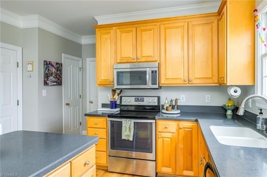 Don't miss this lovely custom brick 2-story home with 5 bedrooms on Salem Glen Country Club in North Carolina - for sale on GolfHomes.com, golf home, golf lot