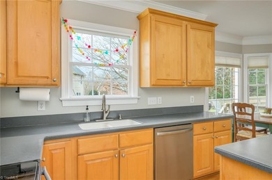 Don't miss this lovely custom brick 2-story home with 5 bedrooms on Salem Glen Country Club in North Carolina - for sale on GolfHomes.com, golf home, golf lot