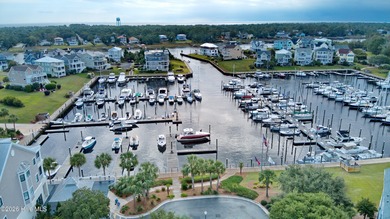 Discover an exceptional homesite in the prestigious, gated on Members Club At St. James Plantation in North Carolina - for sale on GolfHomes.com, golf home, golf lot