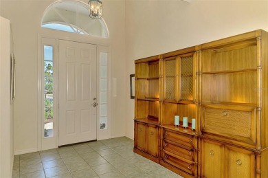 This FABULOUS 2 bed, 2 bath home with a den and 2 car garage is on Calusa Lakes Golf Club in Florida - for sale on GolfHomes.com, golf home, golf lot