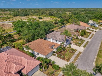 This FABULOUS 2 bed, 2 bath home with a den and 2 car garage is on Calusa Lakes Golf Club in Florida - for sale on GolfHomes.com, golf home, golf lot