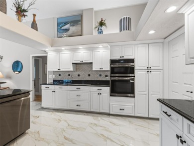 Stunning & newly RENOVATED Arthur Rutenberg home in Prestwick on The Eagles Golf Course and Club in Florida - for sale on GolfHomes.com, golf home, golf lot