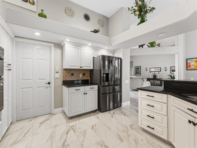 Stunning & newly RENOVATED Arthur Rutenberg home in Prestwick on The Eagles Golf Course and Club in Florida - for sale on GolfHomes.com, golf home, golf lot