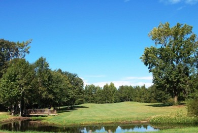 Golf Course site with gorgeous sunsets, and surrounded by on Players Course At Wyboo Plantation in South Carolina - for sale on GolfHomes.com, golf home, golf lot