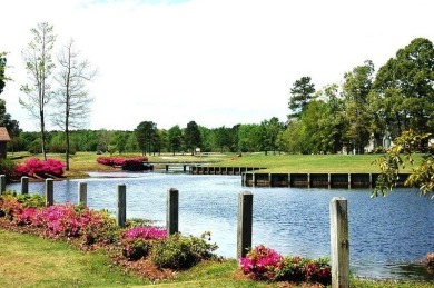 Golf Course site with gorgeous sunsets, and surrounded by on Players Course At Wyboo Plantation in South Carolina - for sale on GolfHomes.com, golf home, golf lot