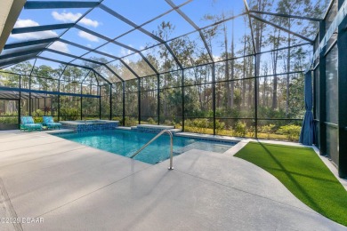 Welcome to this stunning estate home where this luxurious abode on Plantation Bay Golf and Country Club in Florida - for sale on GolfHomes.com, golf home, golf lot