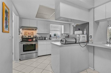 Fully Furnished Palm Aire Home with Sunroom, Golf Course Views & on Palm Aire Country Club of Sarasota in Florida - for sale on GolfHomes.com, golf home, golf lot