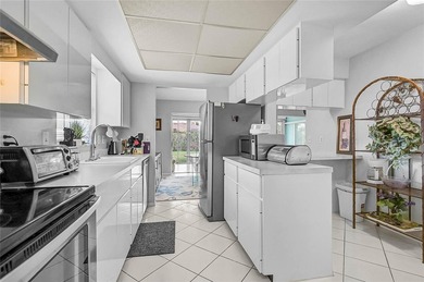 Fully Furnished Palm Aire Home with Sunroom, Golf Course Views & on Palm Aire Country Club of Sarasota in Florida - for sale on GolfHomes.com, golf home, golf lot