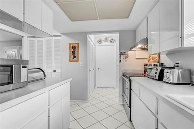 Fully Furnished Palm Aire Home with Sunroom, Golf Course Views & on Palm Aire Country Club of Sarasota in Florida - for sale on GolfHomes.com, golf home, golf lot