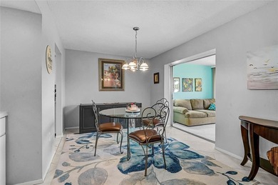 Fully Furnished Palm Aire Home with Sunroom, Golf Course Views & on Palm Aire Country Club of Sarasota in Florida - for sale on GolfHomes.com, golf home, golf lot