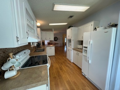 Listed by the Official Sales Team of Cypress Lakes Village on Big Cypress Golf and Country Club in Florida - for sale on GolfHomes.com, golf home, golf lot