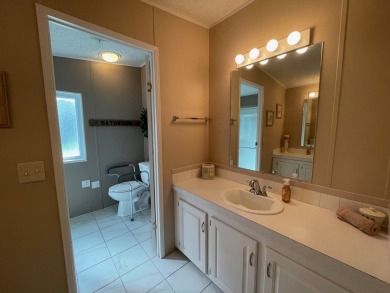 Listed by the Official Sales Team of Cypress Lakes Village on Big Cypress Golf and Country Club in Florida - for sale on GolfHomes.com, golf home, golf lot