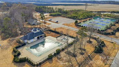 Amazing New Price!! Better than new, this gorgeous home has a on Stonebridge Golf Club in North Carolina - for sale on GolfHomes.com, golf home, golf lot