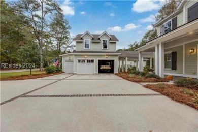 Completed in 2022, this beautiful 5 BR plus office home is on Berkeley Hall Golf Club in South Carolina - for sale on GolfHomes.com, golf home, golf lot