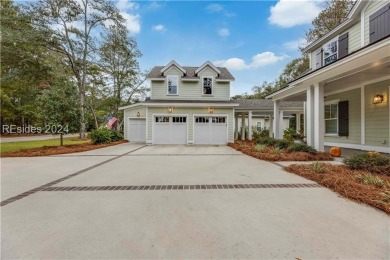 Completed in 2022, this beautiful 5 BR plus office home is on Berkeley Hall Golf Club in South Carolina - for sale on GolfHomes.com, golf home, golf lot