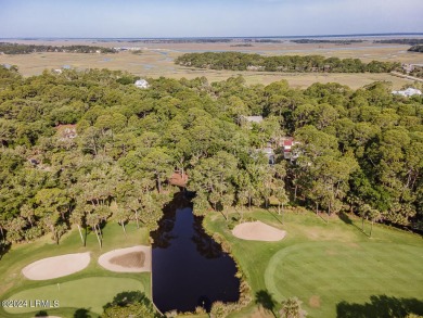 BEAUTIFUL, LUSH,  .56-ACRE LOT looking out over lagoon onto 5th on Ocean Point Golf Links in South Carolina - for sale on GolfHomes.com, golf home, golf lot