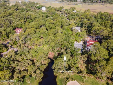 BEAUTIFUL, LUSH,  .56-ACRE LOT looking out over lagoon onto 5th on Ocean Point Golf Links in South Carolina - for sale on GolfHomes.com, golf home, golf lot