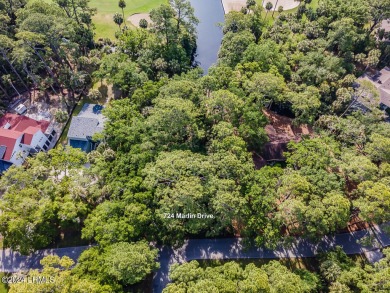 BEAUTIFUL, LUSH,  .56-ACRE LOT looking out over lagoon onto 5th on Ocean Point Golf Links in South Carolina - for sale on GolfHomes.com, golf home, golf lot