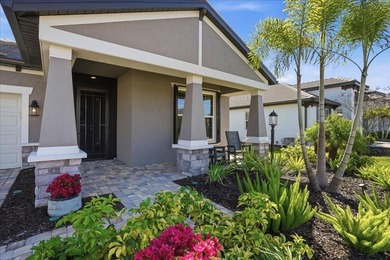 Nearly new pond-view home in the gated River Wilderness Golf & on River Wilderness Golf and Country Club in Florida - for sale on GolfHomes.com, golf home, golf lot