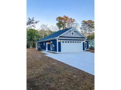 Welcome to 4317 Live Oak Dr, a stunning BRAND NEW, custom built on Glen Dornoch Waterway Golf Links in South Carolina - for sale on GolfHomes.com, golf home, golf lot