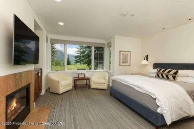 Nestled in the prestigious Maroon Green Townhomes, this on Maroon Creek Club in Colorado - for sale on GolfHomes.com, golf home, golf lot